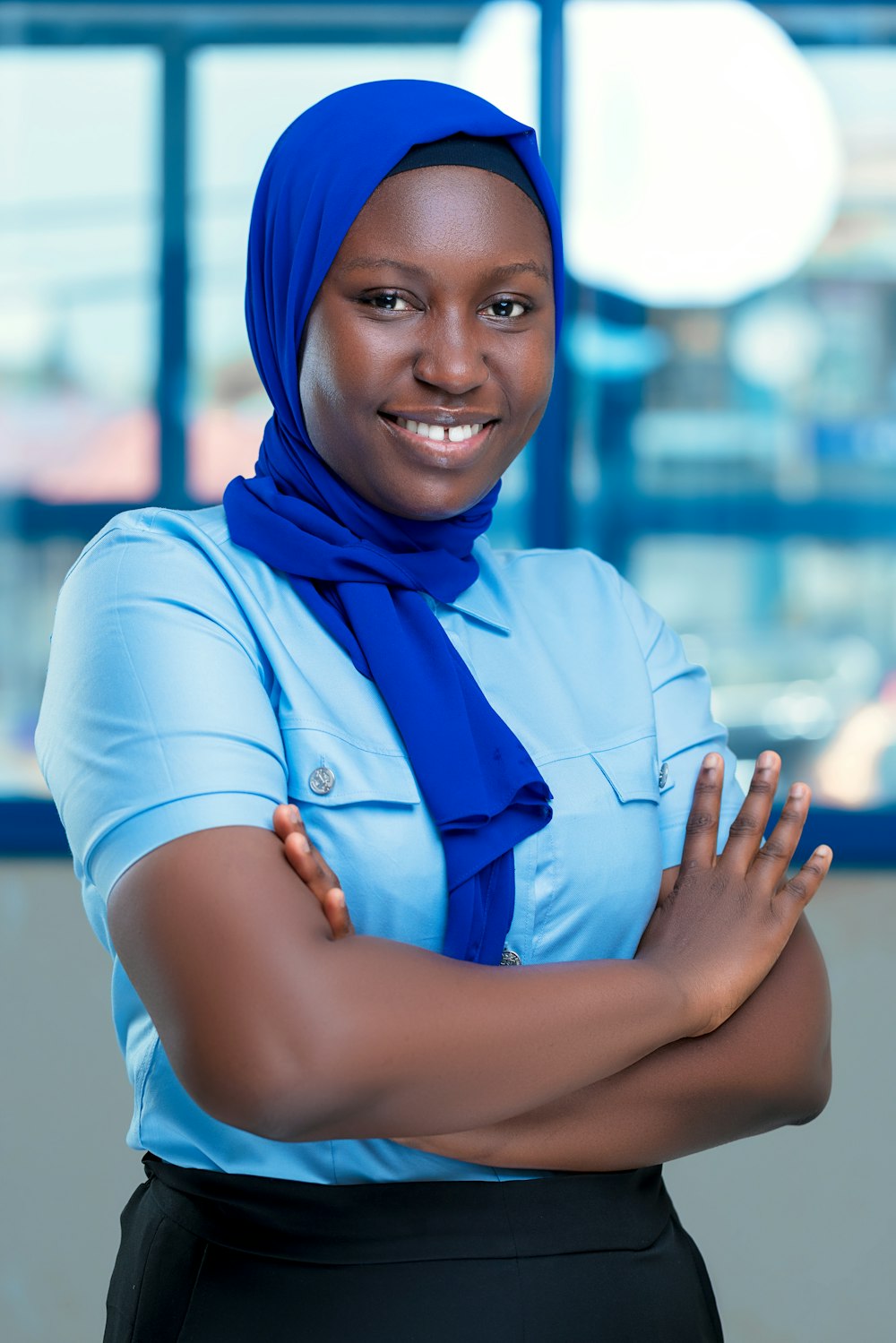 An HR professional standing in an office
